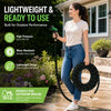 A woman is using a lightweight, durable garden hose for outdoor cleaning tasks.