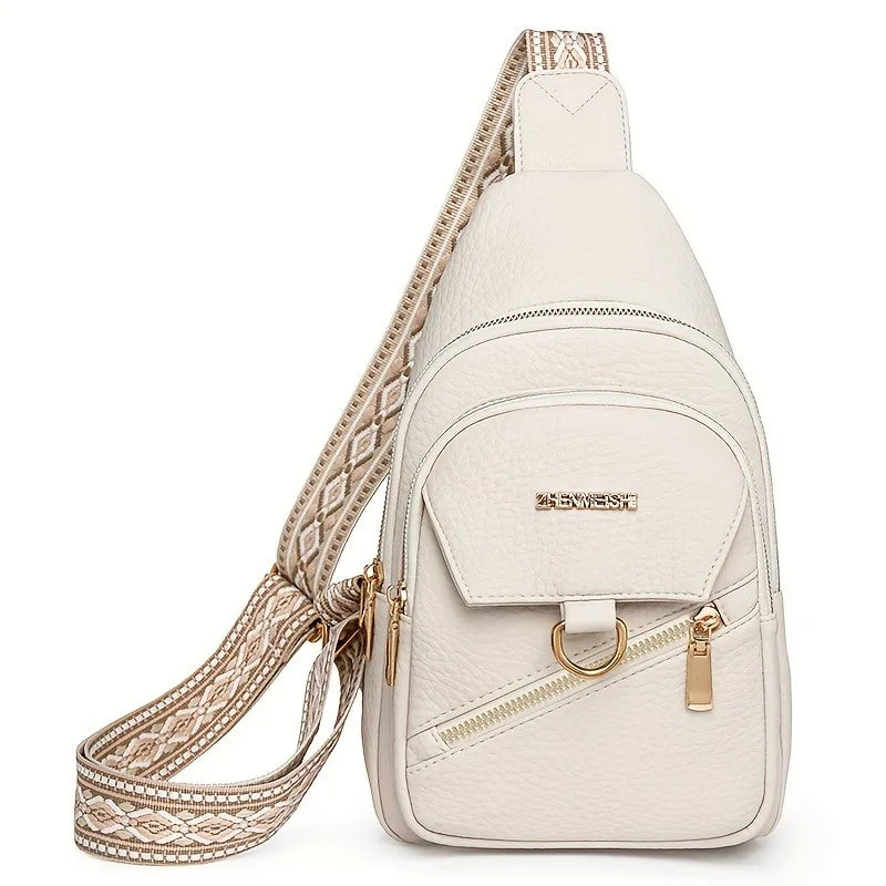 A beige PU leather crossbody bag with a textured strap and gold hardware.