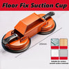 An orange floor fix suction cup tool is shown on a white surface, demonstrating its use for various smooth surfaces.