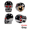A set of four gray skull design tire valve stem caps with red accents.