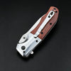 A folding pocket knife featuring a walnut wood handle and stainless steel blade, shown against a dark background.