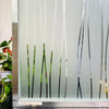 Frosted stripe privacy window film displayed in a glass panel with vertical stripes.