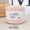 A skein of pink cotton yarn labeled as Cotton Yarn 100g with a measurement of 08 cm.
