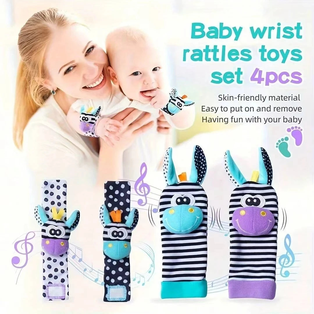 A set of four baby wrist rattles and teether socks in black and purple stripes with musical notes.