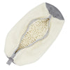 A cream-colored shoe washing machine bag with a gray lining and a soft cleaning brush visible.