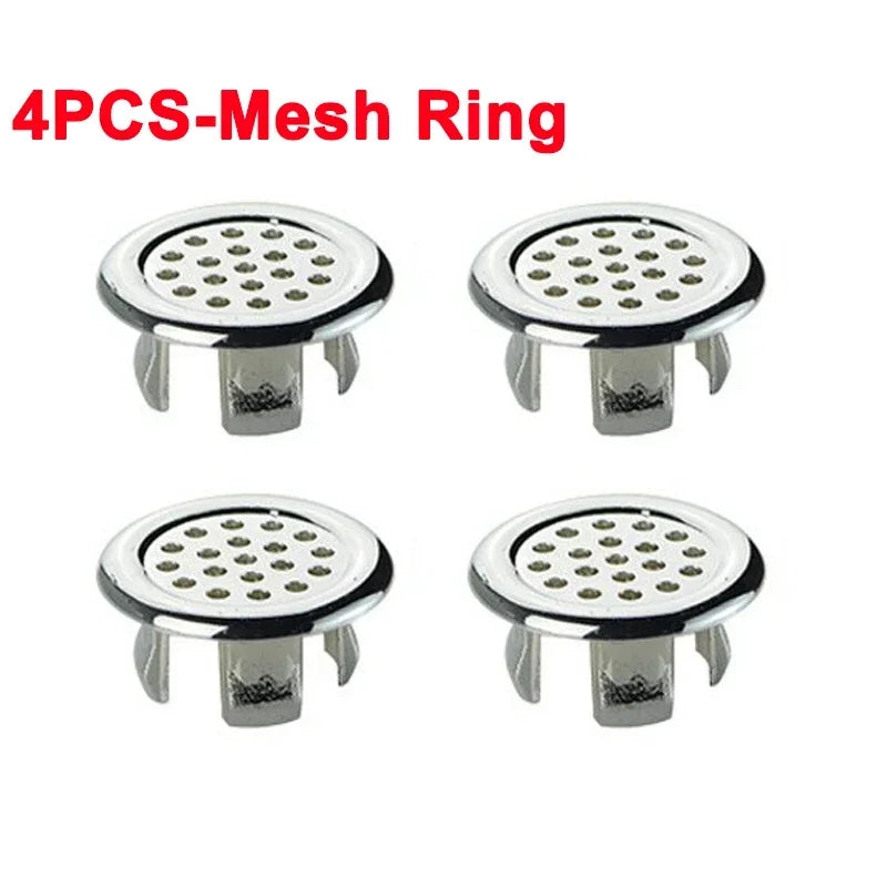 A set of four chrome-plated mesh rings used as sink overflow covers.