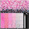 A flatback kit of pink, iridescent, and clear pearls and rhinestones with a tweezer and picker tool.