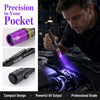 A man uses a compact mini UV flashlight with dual wavelength light on an engine component.