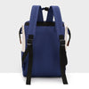 Navy blue insulated canvas mummy diaper bag with black straps and hanging hook