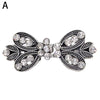 Vintage silver swirl clip featuring clear rhinestones used to fasten cardigans and shawls