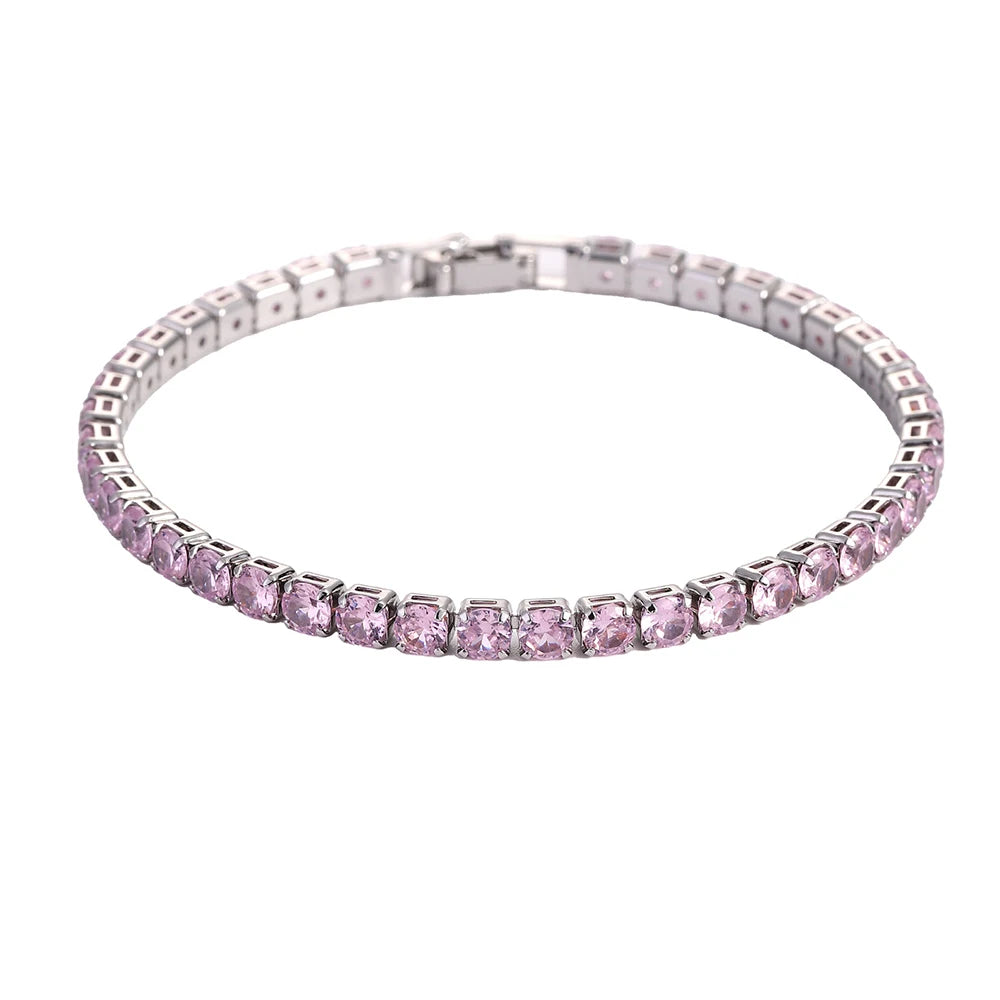 A silver tennis bracelet set with pink and clear cubic zirconia stones.
