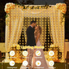 A couple is framed by a sheer curtain of warm string lights in an outdoor setting, showcasing 8 lighting modes.