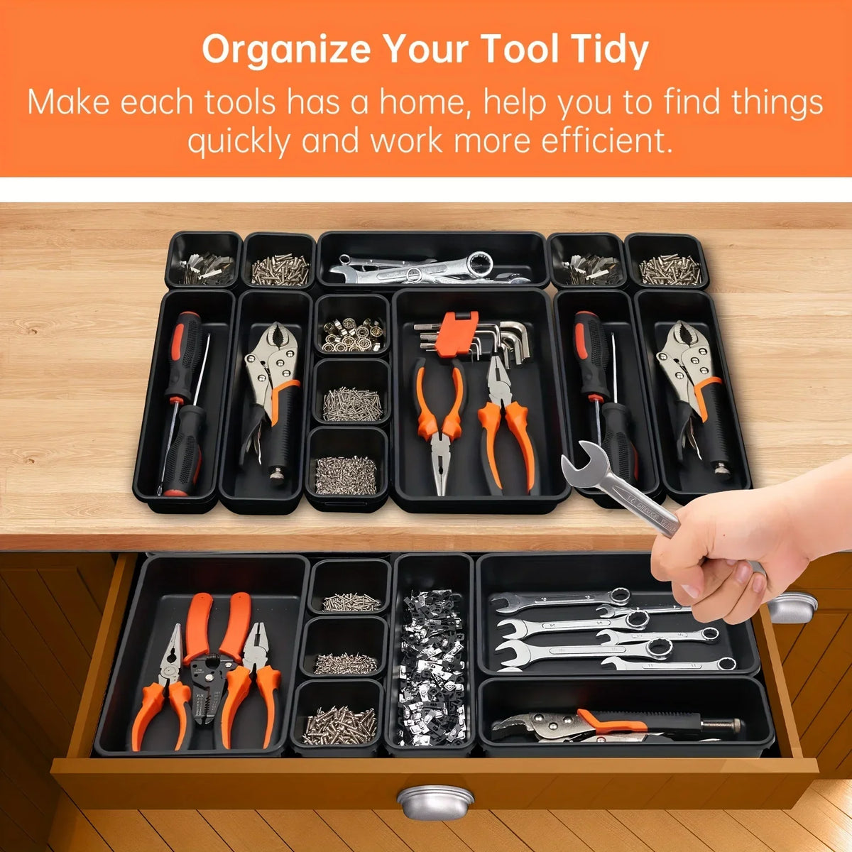 A wooden drawer organizer tray with multiple black compartments holding various tools and hardware.