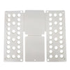 A white portable clothes folding board with multiple circular holes for hanging laundry.
