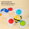 A set of three food-grade silicone spinning top fidget toys for baby teething with colorful watch bands