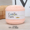 A ball of light pink cotton yarn labeled as Cotton Yarn 100g for knitting and crochet.