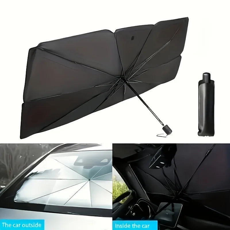 A black foldable car windshield sunshade umbrella shown in use on a vehicle window.