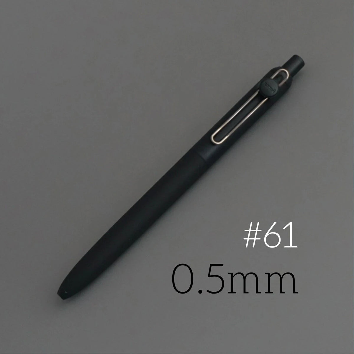 A black Uni ZENTO quick-dry gel pen is shown diagonally against a gray background, with the size marked as 0.5mm.