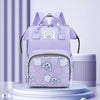 A purple waterproof diaper backpack with a bear print design is displayed on a light blue pedestal.
