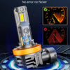 A close-up of an LED headlight bulb assembly with a glowing yellow light, demonstrating 99% compatibility.