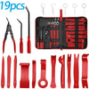 A collection of 19 pieces of red and black car trim removal tools and accessories in a storage pouch.