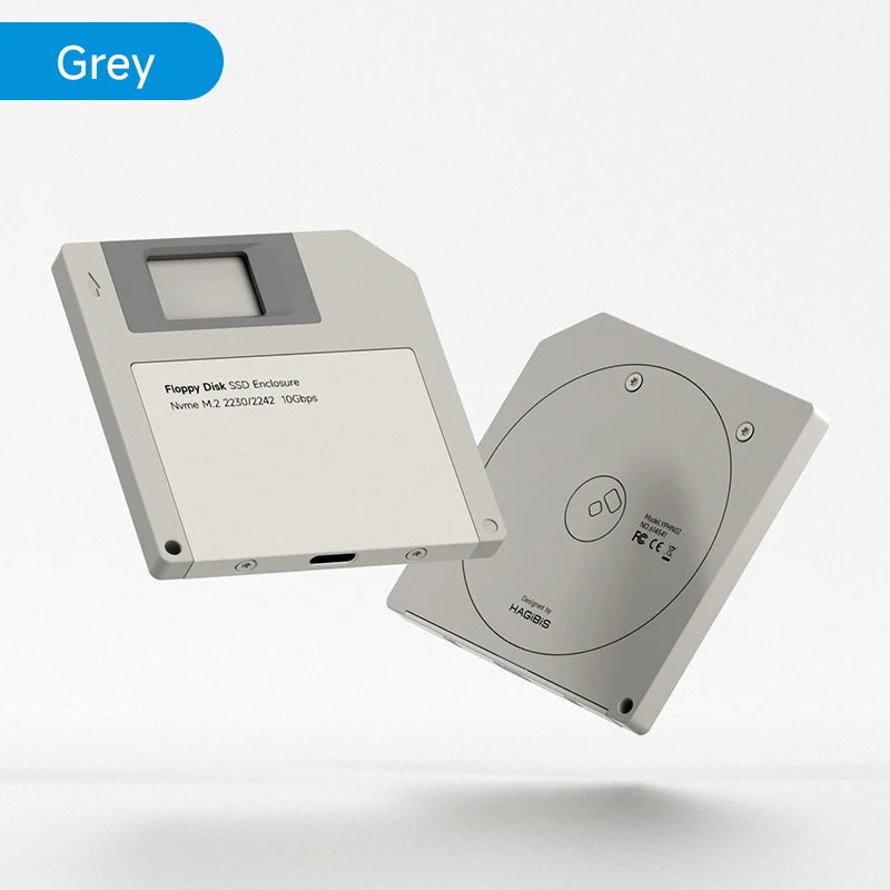 A grey M.2 SSD enclosure is shown, featuring a connector for laptop expansion.
