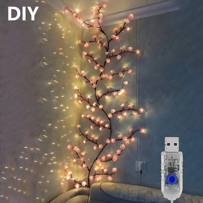 A vertical display of cherry blossom string lights with flower vines illuminating a wall.
