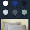 A collection of six sophisticated paint colors including white, navy blue, black, light gray, dark gray, and sage green.