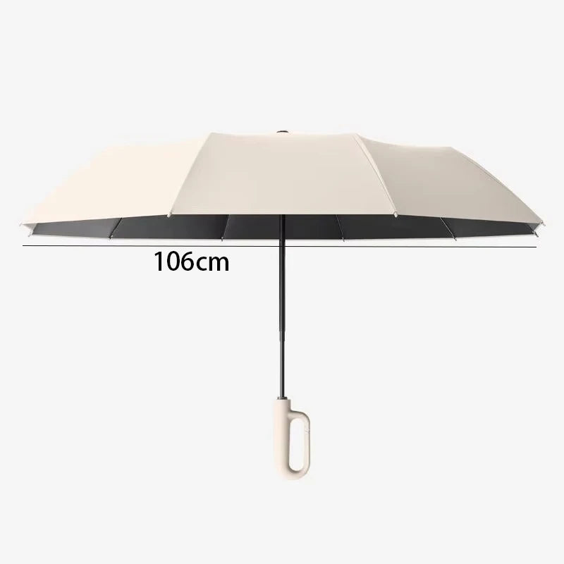 A beige windproof automatic folding umbrella with a dark canopy and a light handle.