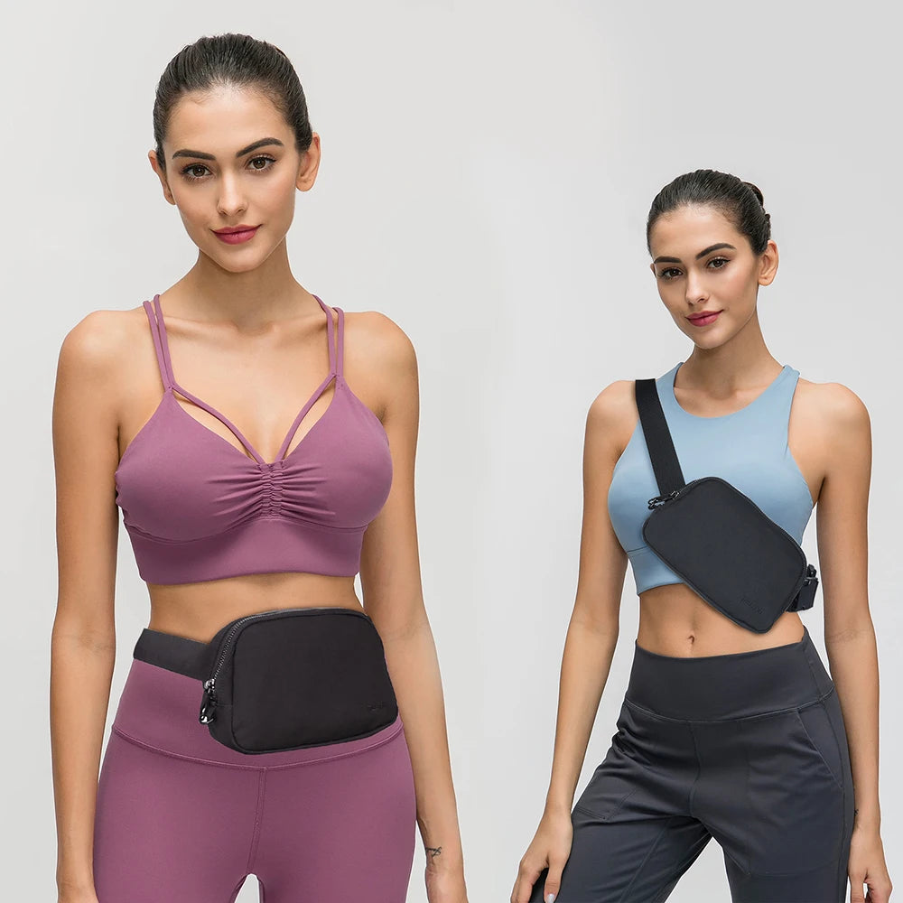 A female model wearing a purple sports bra and matching leggings with a black nylon waist pack.