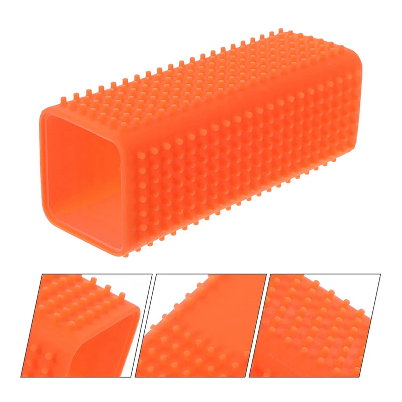 Orange silicone pet hair remover brush with a textured surface shown from the side and angled views.
