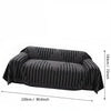 Black woven striped sofa cover or throw for a living room