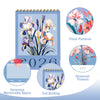 A desk calendar featuring floral patterns, seasonal flowers for May, and coil binding.