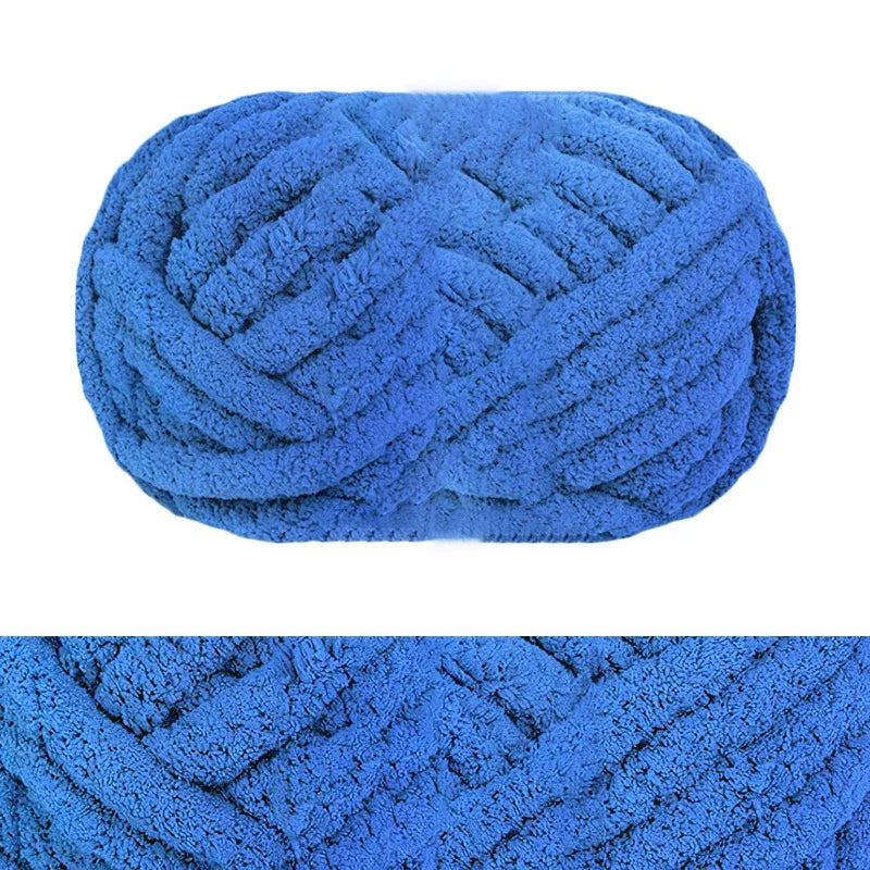 A ball of bright blue chunky chenille yarn used for hand knitting and crochet