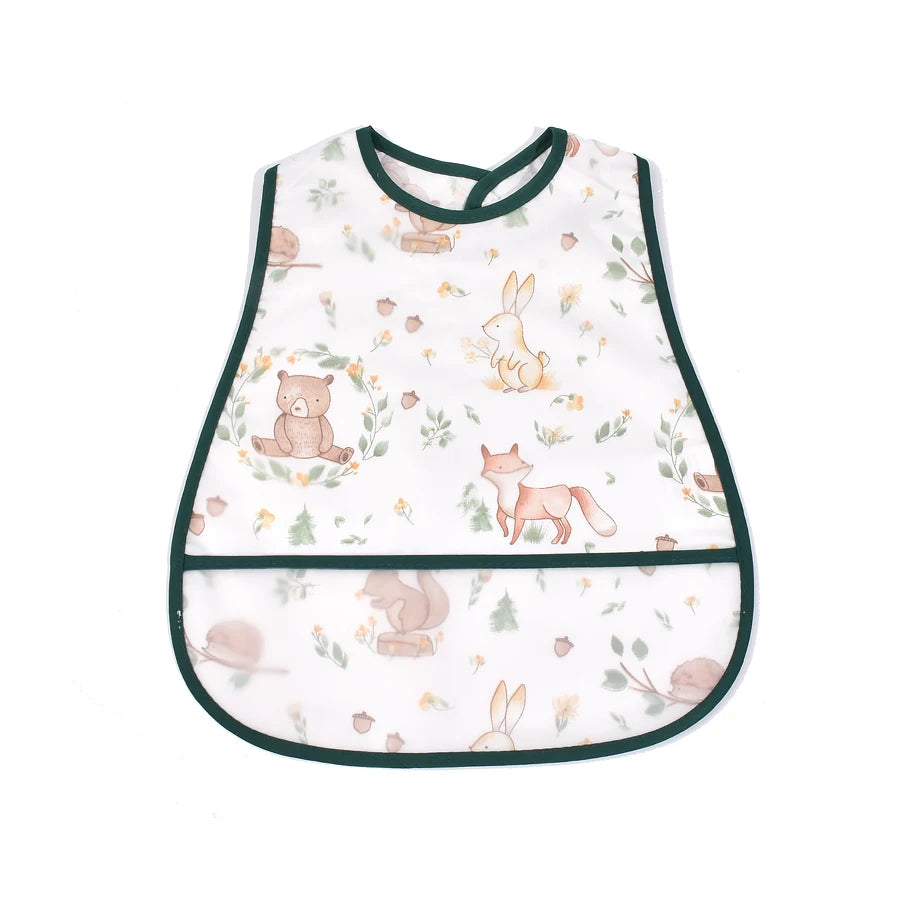 White baby feeding bib with a green trim featuring a pattern of cute animals like bears and rabbits.