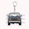 A silver metal key ring attached to a keychain featuring an off-road truck silhouette.