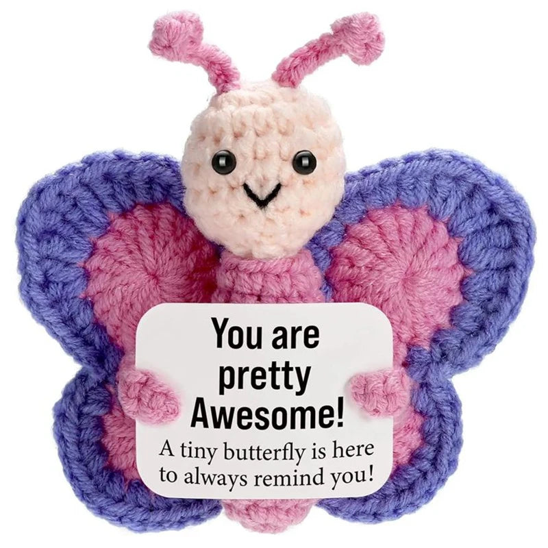 Handmade crochet butterfly doll in purple and pink with a positive message card