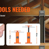 Close-up of an orange adjustable steel floor jack used to adjust the height of a wooden beam.
