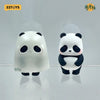 A white blind box panda figure with black accents is displayed against a light gray background.