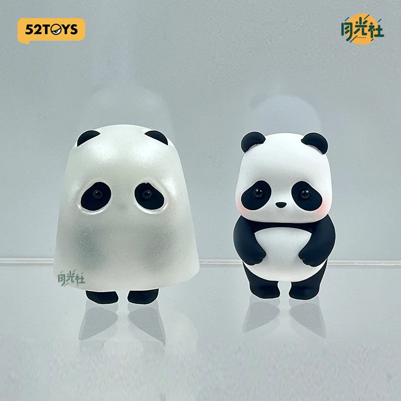 A white blind box panda figure with black accents is displayed against a light gray background.