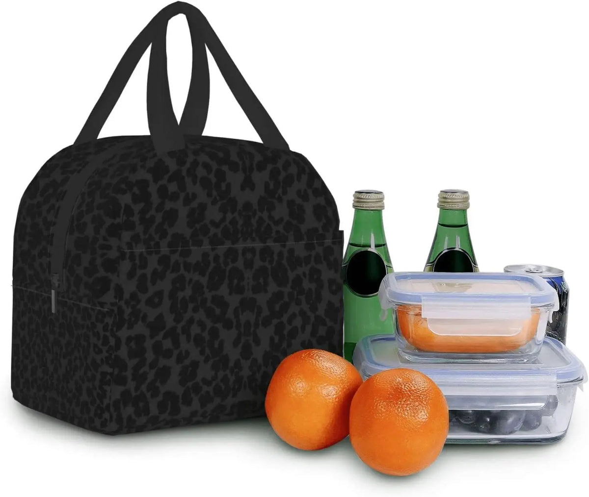 A black leopard print insulated lunch tote bag next to a glass bottle and an orange fruit.