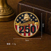 A round enamel lapel pin featuring a sailing ship silhouette over a patriotic American flag design with the text AMERICA'S NA