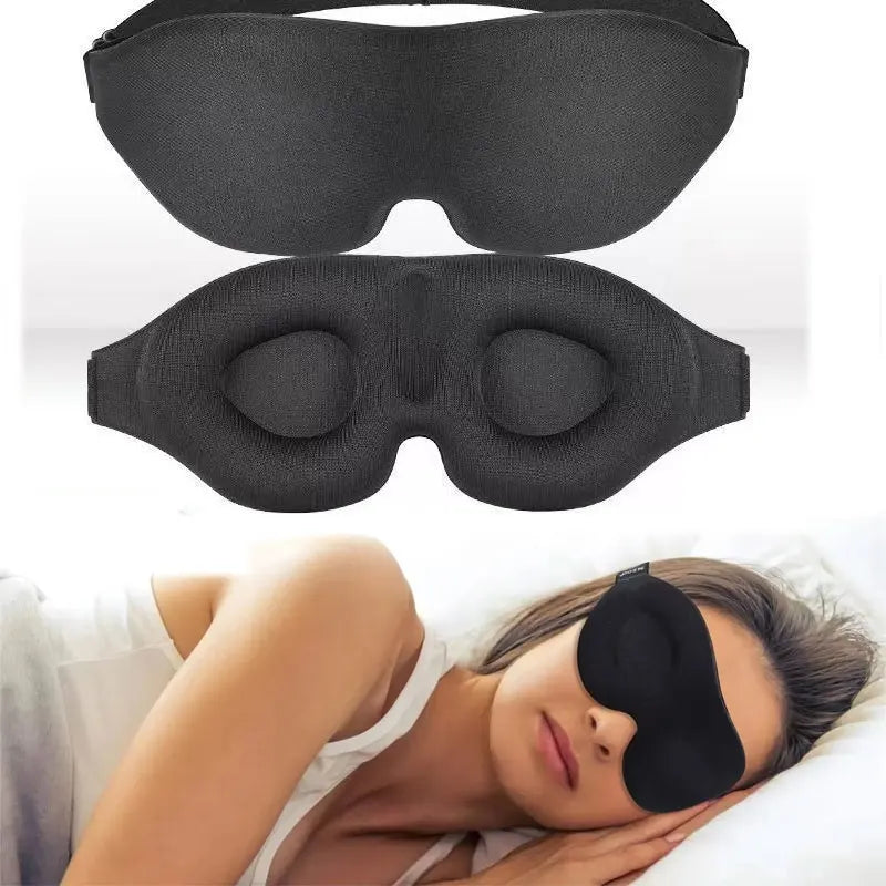 A black 3D contoured silk-touch sleep mask is shown in multiple views and being worn by a person.
