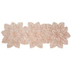 A set of ornate, light brown PVC table runners and placemats featuring intricate floral designs.