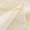 A close-up of a cream-colored shower curtain fabric with a subtle white striped pattern and a gathered edge.
