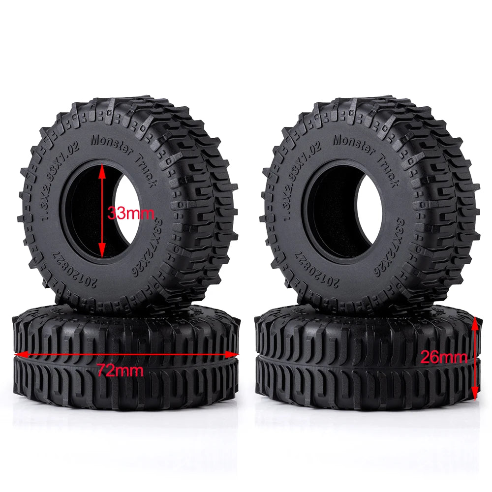 Black mud terrain wheel and tire set with a mounted motor and rubber tire