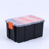 A black plastic tool box organizer with an orange lid and a small orange tab.