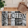 A rectangular kitchen mat featuring vertical wood grain patterns and the text seasoned with love