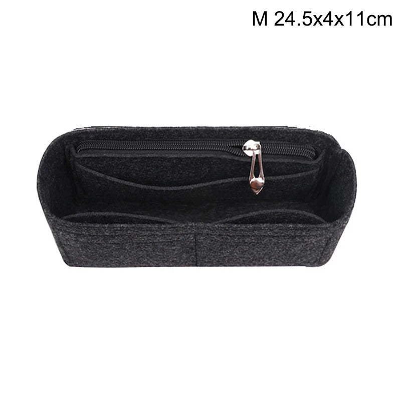 Black felt bag organizer with a zippered compartment and a hanging loop.