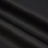 Dark gray faux leather sheets draped and folded, showing texture and subtle sheen.